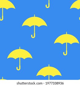 Seamless pattern with yellow umbrella on blue sky background. Print for textile, banner, weather forecast, website