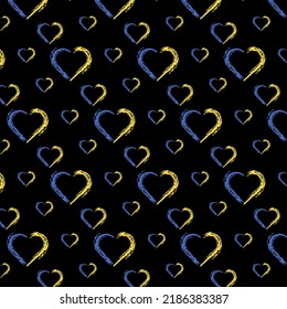 Seamless pattern with yellow-blue hearts on a black background.Vector illustration.