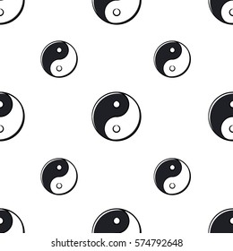 Seamless pattern with ying yang on white background