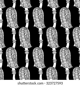 Seamless pattern with zentangle amanita mushrooms. Vector triangle background texture