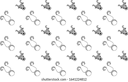 Seamless pattern for the zodiac sign Taurus in black and white colors. Ethnic bull heads and astrological symbols. Astrological texture for textiles, wallpaper, fabric and wrapping paper. Vector.