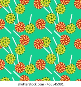 Seamless pattern.Candy Lollipop.Green background.Template for printing onto fabric, textiles, packaging paper.