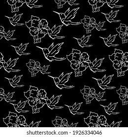 Seamless patterns. Beautiful blooming flowers with hummingbirds. The background is textile. Line graphics. 