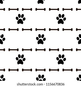 Seamless patterns with black animal footprints and bones. Vector illustration