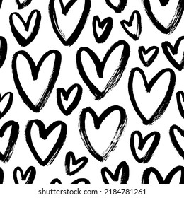 Seamless patterns with black hearts. Trendy texture with a jumble of hearts. Hand drawn black brush strokes. Simple repeating texture for Valentine's day or wedding. Love and romantic motif background