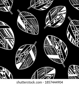 Seamless patterns. Black and white vector illustration. Abstract leaves on a black background.