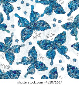 Seamless patterns with butterflies. Various blue butterflies and flowers on white background.