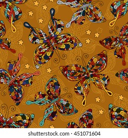 Seamless patterns with butterflies. Various butterflies and flowers on brown background.