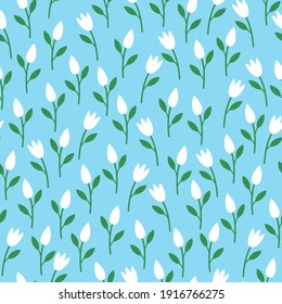 Seamless patterns. Delicate white flowers on blue background. Vector.