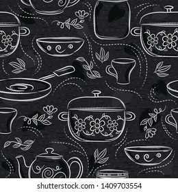 Seamless patterns with different tableware, flower, pot, saucepan, cup on black chalkboard. Ideal for printing onto fabric and paper or scrap booking.