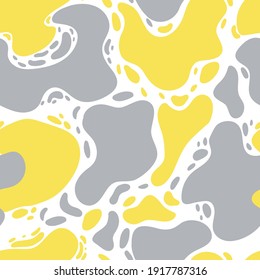 Seamless patterns Hand-drawn doodles in the trendy colors yellow and gray. Vector wallpaper in a minimalist style on an isolated white background. Abstract forms. For textile prints or wrapping paper.