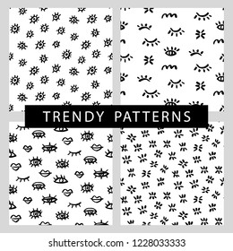 Seamless patterns set with trendy hand drawn minimal eyes shapes, isolated on white. Apparel, textile, wallpaper, fabric, web page background. Vector illustration. Black and white.