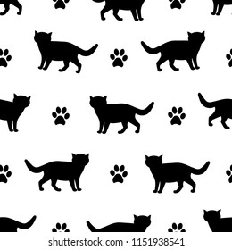 Seamless patterns with silhouettes of the black cat and footprints. Vector illustration