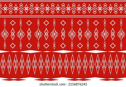 Seamless patterns of white color geometric ornaments on red background
