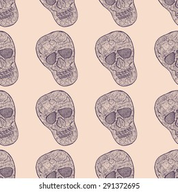 Seamless pattern.Vector illustration with hand drawn skull. 