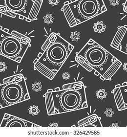 Seamless photo camera pattern background. Hand-drawn backdrop.