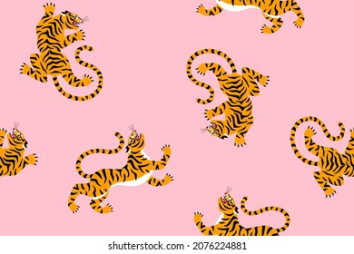 Seamless pink exotic pattern with cute cartoon tiger silhouettes. Vector illustration. Circus animal fabric ornament print.