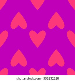 Seamless pink hearts pattern in bright pink over purple. Valentine's day tile background. Romantic vector pattern.
