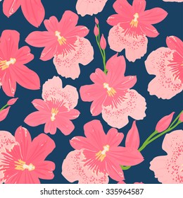 Seamless pink orchid, cambria flower pattern on dark blue background