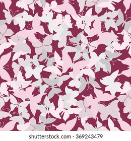 Seamless pink pattern with silhouettes of butterflies