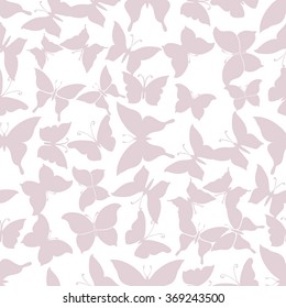 Seamless pink pattern with silhouettes of butterflies