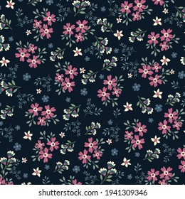 A seamless pink, white, and blue floral pattern on a dark background