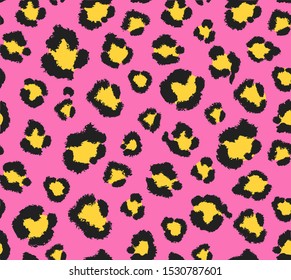 Seamless pink  and yellow leopard pattern 80s 90s style.Fashionable exotic animal print.Vector