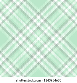 Seamless plaid check pattern in pale green and white. 