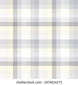 Seamless plaid pattern in shades of gray, cream, ivory and white.