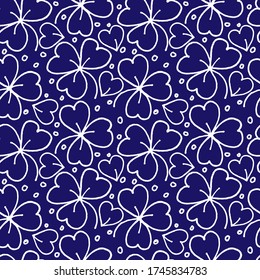 seamless plant pattern, clover leaves on a blue background