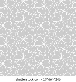 seamless plant pattern, clover leaves on a gray background