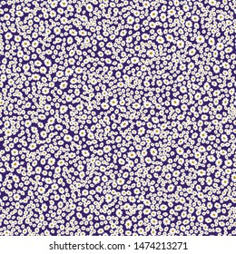 Seamless plant pattern. Small cute flowers of daisy. Trendy floral background for fashion prints, wallpaper, surface. Chaotic order. Country style