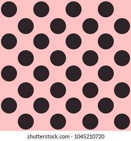 Seamless polka dot pattern. Black dots on pink background. Vector illustration.