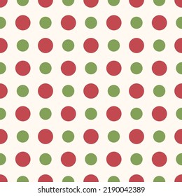 Seamless polka dot pattern for Christmas. Red and green dots on white background.