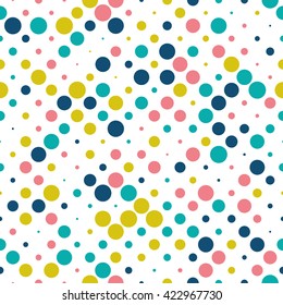 Seamless polka dot pattern with circles of fresh colors on a white background. Vector repeating texture.