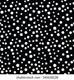 Seamless polka dot pattern. Geometric black and white vector background. Spot of different sizes placed randomly. Useful for fabric print, interior decorating, home textiles, wrapping paper, apparel