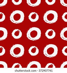 Seamless polka dot pattern. Hand drawn background.