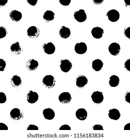 Seamless polka dot pattern. Symmetric ornament. Vector textured hand drawn geometric pattern. Abstract background with round brush strokes.
