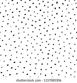 Seamless polka dot pattern. Vector textured hand drawn pattern. Abstract background with brush strokes.