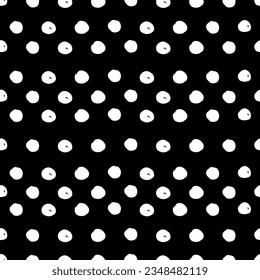 Seamless polka dot pattern. Vector pattern with white circles on black background.