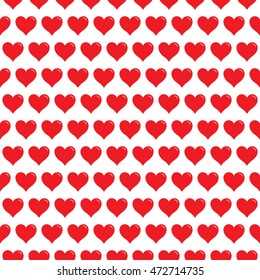 Seamless polka dot pink hearts pattern. Hearts of small mosaic faceted triangles.