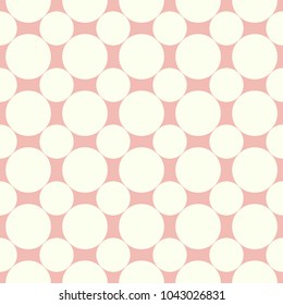 Seamless polka dot pink pattern with circles. Vector