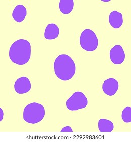 Seamless polka dots pattern. Violet hand-drawn circles on light yellow background. Abstract Random big points ornament. Vector doodle illustration for wallpaper, fabric, print, wrapping paper, textile