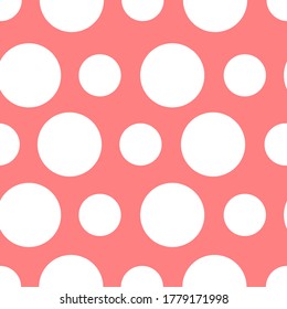 patrón de polkadot sin soldadura con fondo color pastel rojo adecuado para la textura de fondo o de azulejos