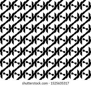 Seamless polygonal spiral shape with a fan in the middle. Geometric monochrome abstract backgrounds suitable for fabric motifs.