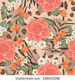 Seamless print of animal skin leopard and tropical plants. Seamless pattern painted by hand. Hand-drawing of animal skin and tropical plants. Vector illustration.