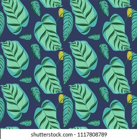 seamless print with tropical leaves on blue background. Large exotic tree leaves