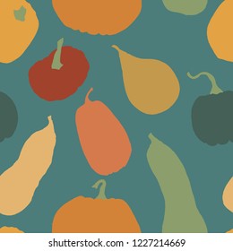 Seamless pumpkin pattern design. Colorful pumpkins on teal background. Autumn hand drawn elements in rustic vintage color palette.
