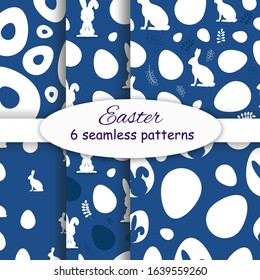 Seamless rabbit animal pattern cartoon on classic blue color vector. Easter set patterns. Set easter seamless patterns. Easter bunny classic blue