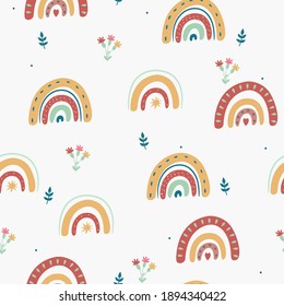 Seamless rainbow pattern in boho style. Vector graphics.
